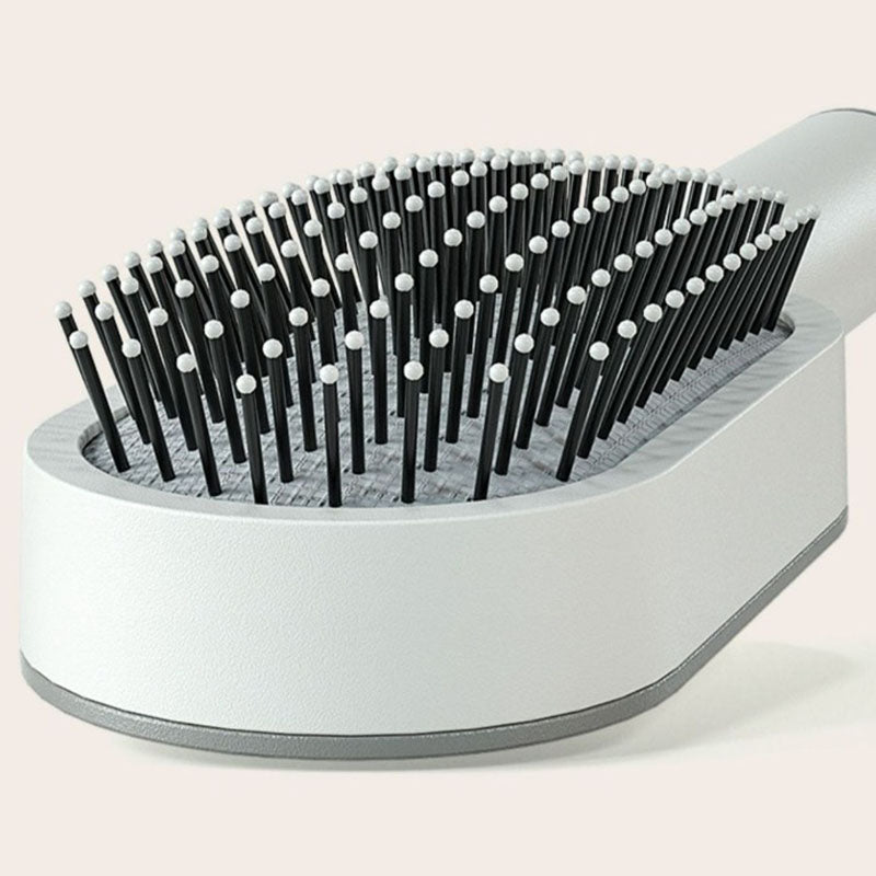 Brosse à Cheveux Auto-Nettoyante Hairclick®